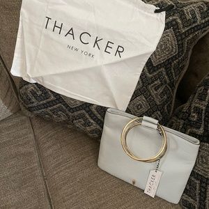 New authentic THACKER PURSE LIGHT BLUE